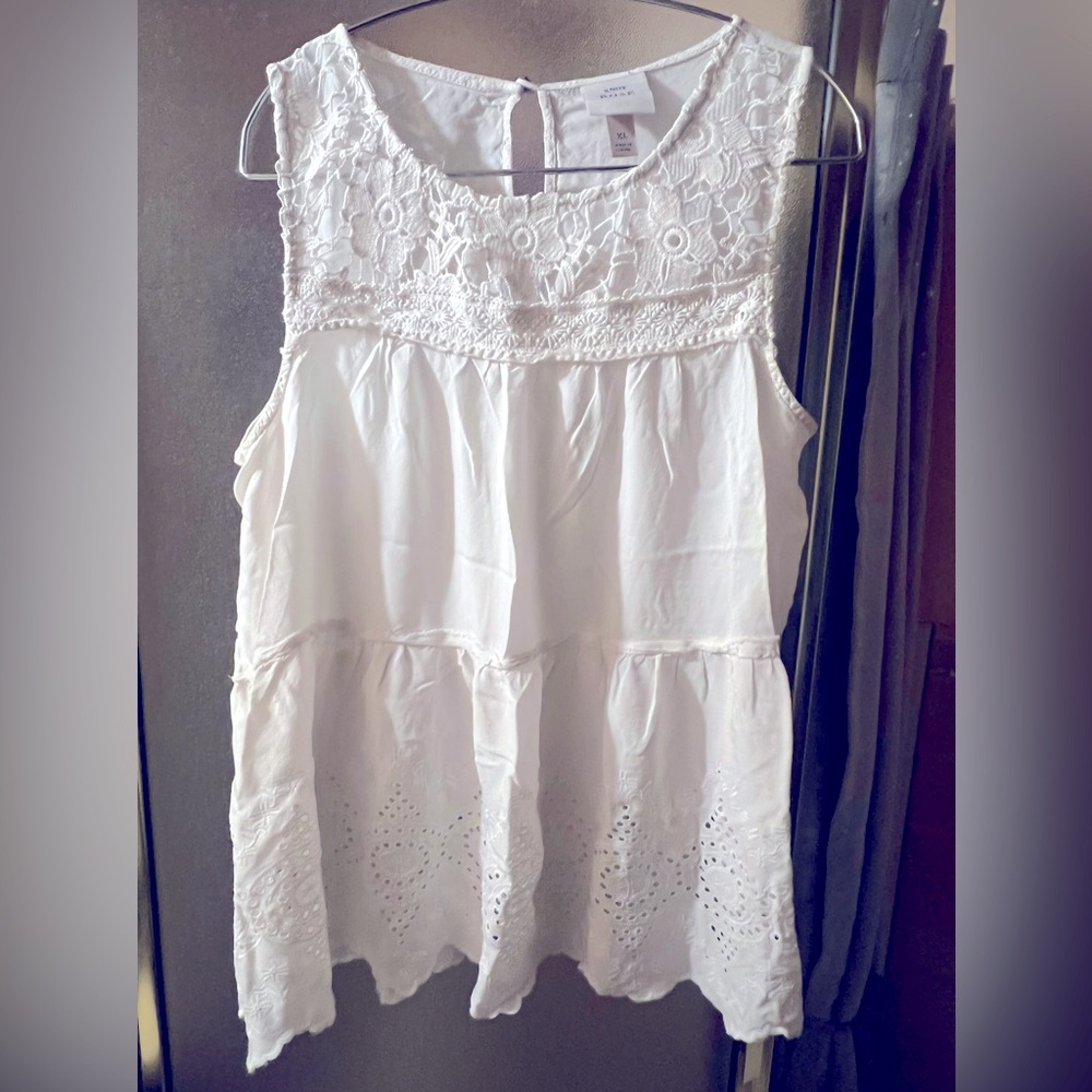 Light airy cute white top with lace accent.